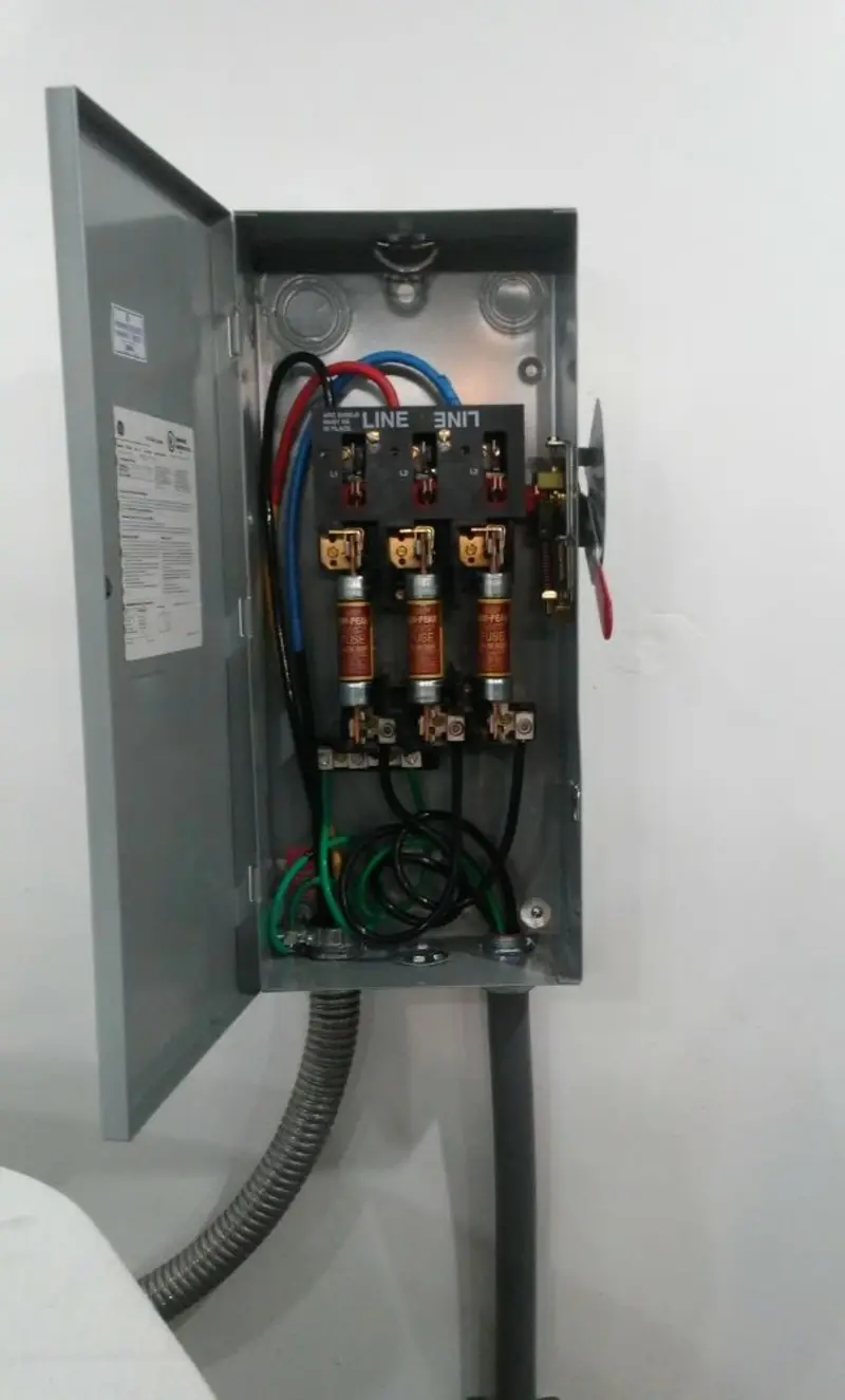 Three-phase disconnect switch installed for Smoke Detector Installation in Granger